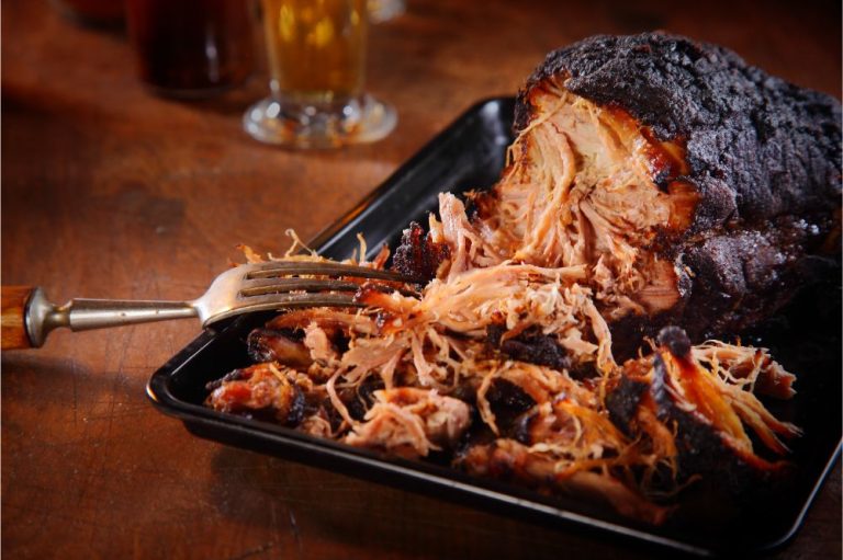 Appetizing Pulled Pork on Black Tray